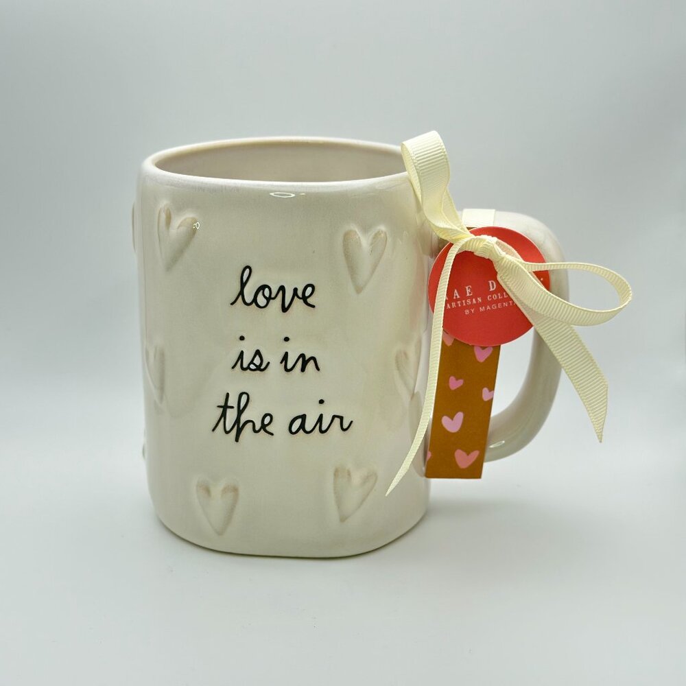 Love is in the air Valentine's mug with raised heart pattern by Rae Dunn